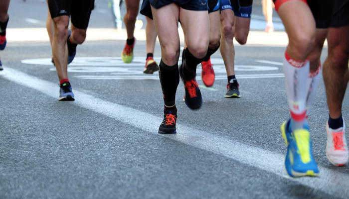 This representational image shows people during a marathon. Unsplash/File