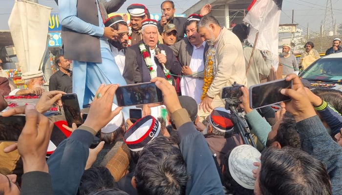 Qaumi Watan Party (QWP) Chairman Aftab Ahmad Khan Sherpao speaks with the supporters in Charsadda on December 21, 2023. — Facebook/Aftab Ahmad Khan Sherpao