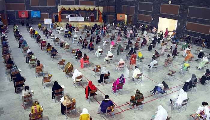 Candidates during a of National University of Medical Sciences can be seen in this image. — APP/File