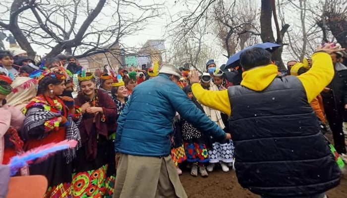 People enjoy and dance during the Kalash Winter Festival of 2023 on December 17, 2023. — Facebook/Kalash Explorer
