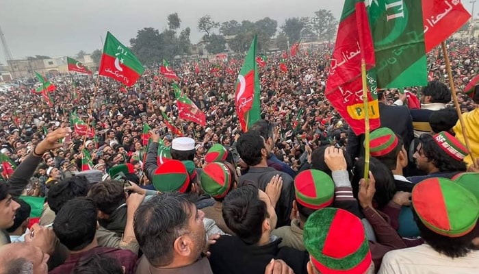 The image released on Dec 8, 2023 shows PTI workers attend partys workers convention in Nowshera. —x/MeFaheem