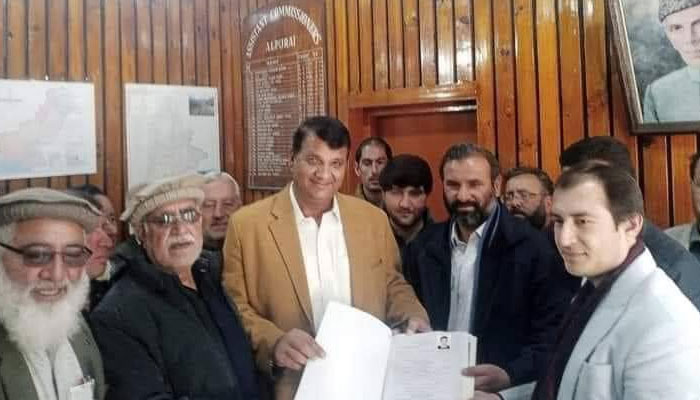 Amir Muqam submits his nomination papers on Dec 23, 2023. — Facebook/Shangla Point
