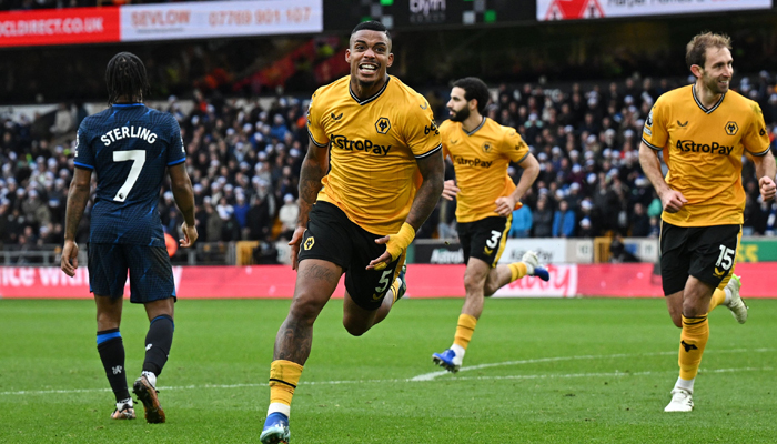 Wolverhampton Wanderers Mario Lemina celebrates after scoring his teams first goal during the English Premier League football match against Chelsea at the Molineux stadium England on December 24, 2023. — AFP