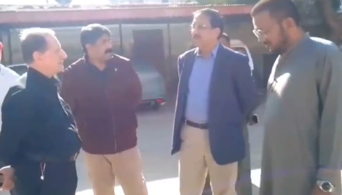 Sindh Solid Waste Management Board (SSWMB) MD, Naseemuddin Mirani (2nd R) interacts with their organizers during visits to the church in Karachi on December 24, 2023. — Facebook/Sindh Solid Waste Management Board Official