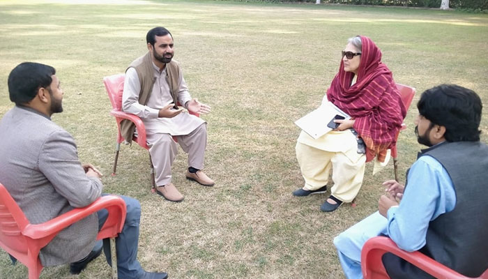 Al Mohsin group leader Jugnu Mohsin meeting with people on December 12, 2023. — Facebook/Jugnu Mohsin