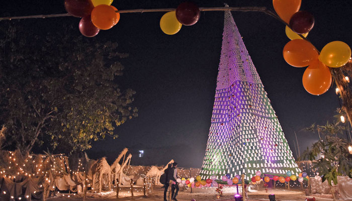 A view of decorates of a street with colorful lights in a Katchi Abadi at sector G-7 ahead of the Christmas ceremony celebration in the Federal Capital on December 25, 2023. —ONLINE