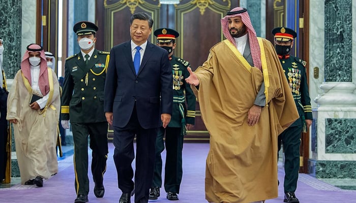Saudi Crown Prince Mohammed bin Salman, right, welcomes Chinese President Xi Jinping to the palace in Riyadh. — AFP/File