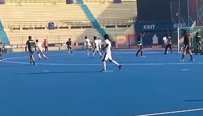 Hockey players of the teams  Olympians XI and Pakistan Greens XI during an exhibition Quaid-e-Azam Day hockey match at astro-turf of National Hockey Stadium in this still on December 25, 2023. — Facebook/Directorate General Sports & Youth Affairs, Punjab