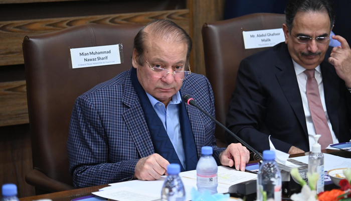 Former prime minister Nawaz Sharif looks on in this image after meeting with the business community in Lahore on November 25, 2023. — Facebook/Maryam Nawaz Sharif