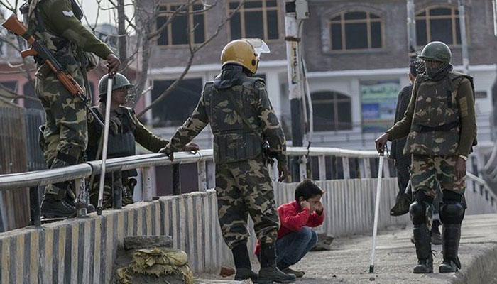 The picture shows Indian troops punishing a Kashmiri child. — x/ladywannafly