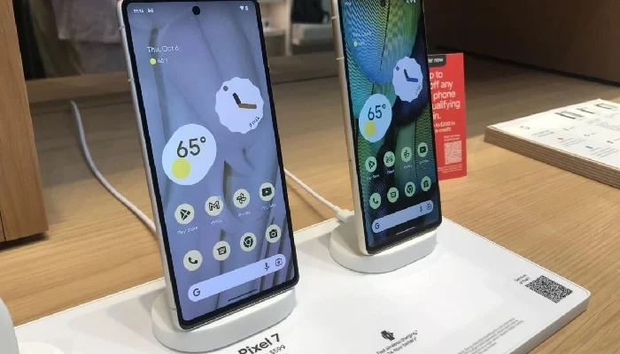 This image shows two smartphones on a display. — AFP/File