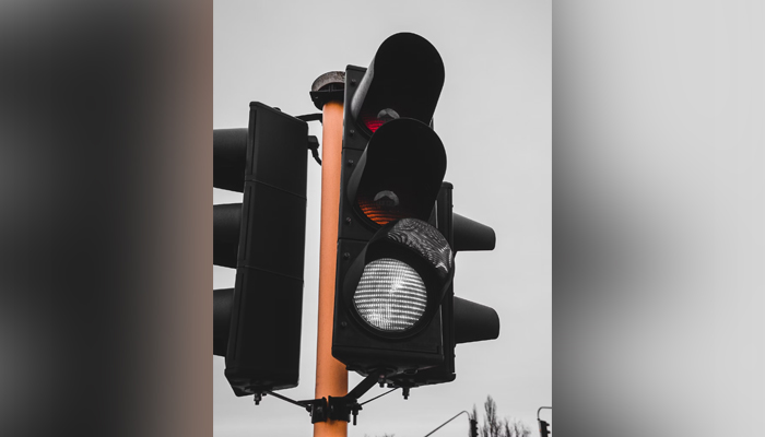 This representational image shows a traffic light on the signal. — Unsplash