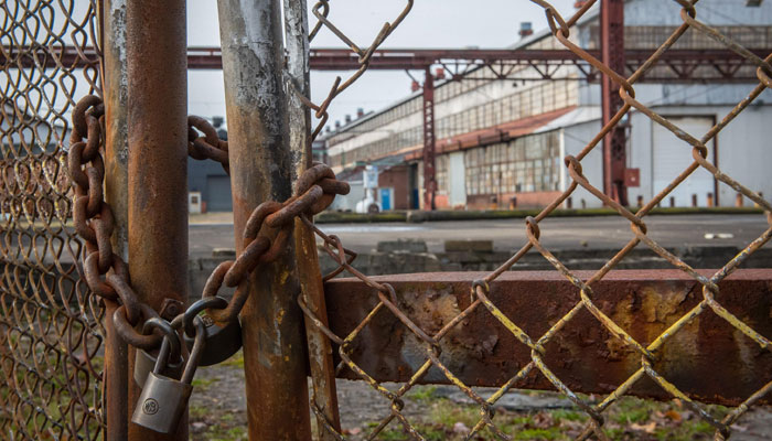 Representational image of a locked factory. — USW Locals