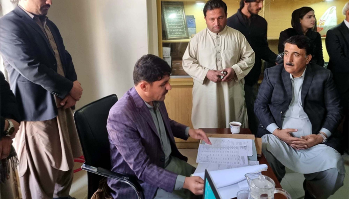 Balochistan Awami Party (BAP) Leader, Naseebullah Bazai submits his nomination papers to the returning officer to participate in the upcoming General Election 2024, in Quetta on Friday, December 29, 2023. — PPI