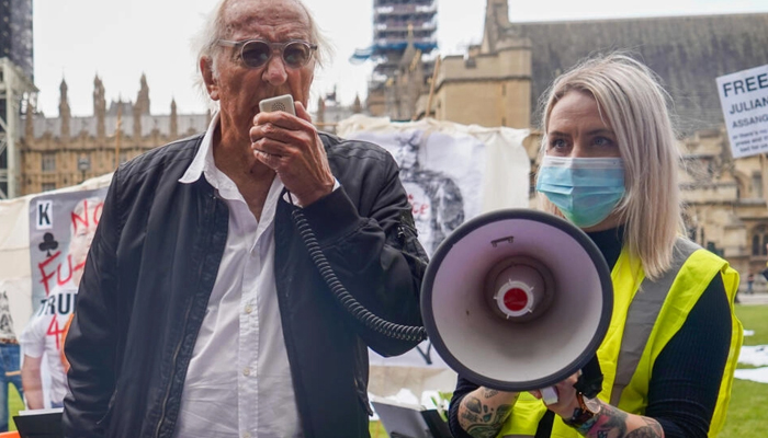 John Pilger at a 2021 rally in London to mark WikiLeaks founder Julian Assanges 50th birthday. — AFP