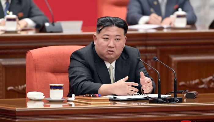 This picture on December 31, 2023 shows North Korean leader Kim Jong Un taking part in the 9th Plenary Session of the 8th Central Committee of the Workers Party of Korea (WPK) at the Partys Central Committee headquarters building in Pyongyang. — AFP