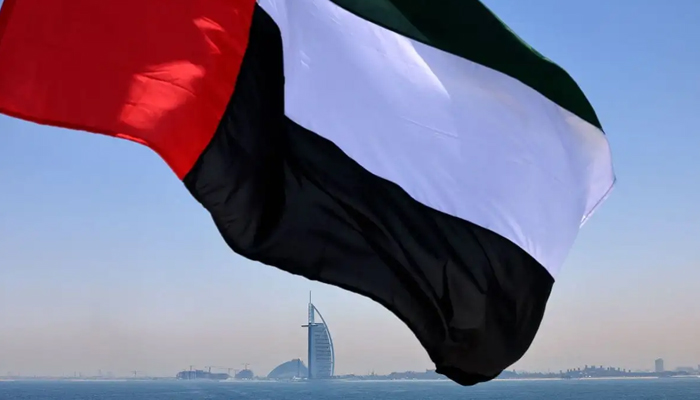 An Emirati flag fluttering above Dubai. — AFP/File