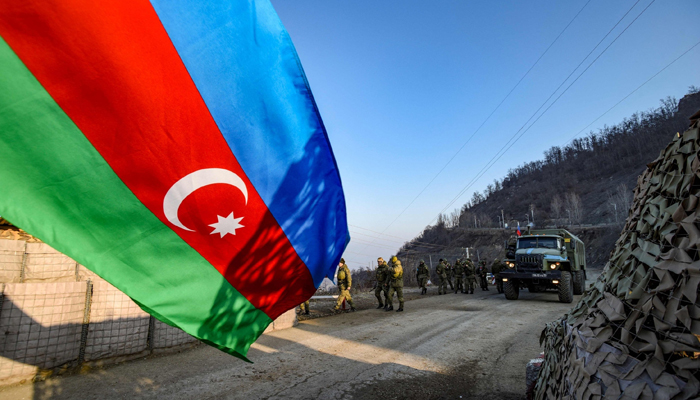 Russian peacekeepers are seen deployed at the Lachin corridor in Karabakh, as Azerbaijani environmental activists protest illegal mining, in Azerbaijan. — AFP