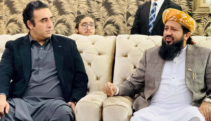 Peoples Party (PPP) Chairman, Bilawal Bhutto Zardari (L) exchanges views with Jamiat Ulema-e-Islam (JUI-F) Sindh General Secretary, Maulana Rashid Mahmood Soomro during a condolence meeting on the death of his young daughter in Karachi on January 2, 2024. —PPI
