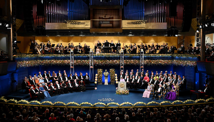 A general view shows members of the Swedish Royal family (R), the Nobel Prize laureates and guests attending the Nobel awards ceremony at the Concert Hall in Stockholm on December 10, 2023. — AFP