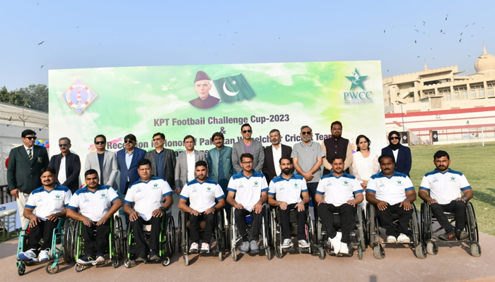 Pakistans wheelchair cricket team during a group photo with the former cricketer Younis Khan in Karachi on January 1, 2024. — Facebook/Pakistan wheelchair cricket team