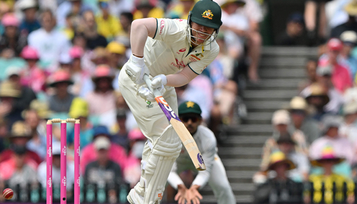 Australias David Warner plays a shot during the second day of the third cricket Test match between Australia and Pakistan at the Sydney Cricket Ground in Sydney on January 4, 2024. — AFP