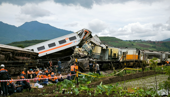Search and rescue teams work at the scene of a train accident in Cicalengka, West Java province on January 5, 2024. — AFP