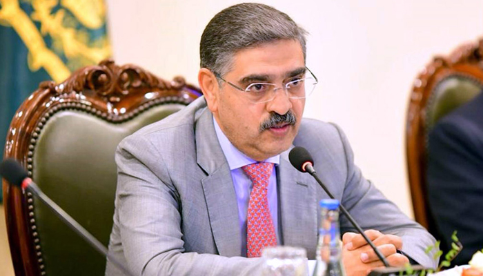 Caretaker Prime Minister Anwaar-ul-Haq Kakar addresses the Envoys Conference on January 4, 2024.— APP