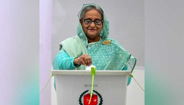 Bangladeshs Prime Minister Sheikh Hasina casts her vote at a polling station in Dhaka on January 7, 2024.— AFP