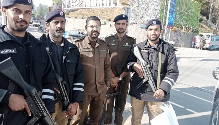 This image shows Rawalpindi Police officials standing guard on December 31, 2023. — Facebook/Rawalpindi Police