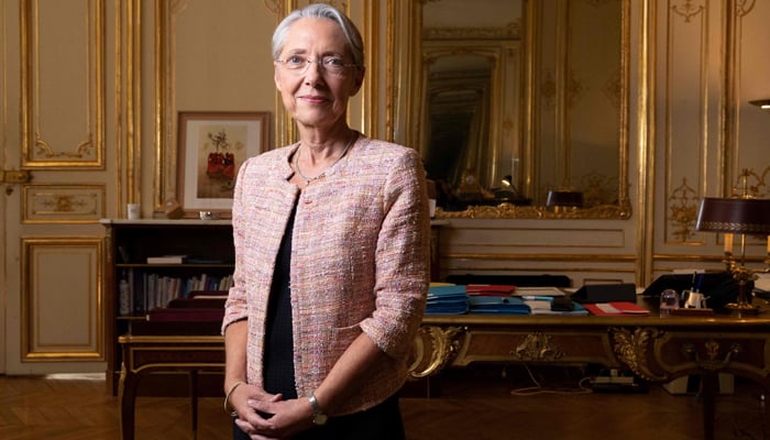 French PM Elisabeth Borne poses in her office at HÃtel de Matignon, the official residence of the PM of France, on May 31, 2022 in Paris. — AFP