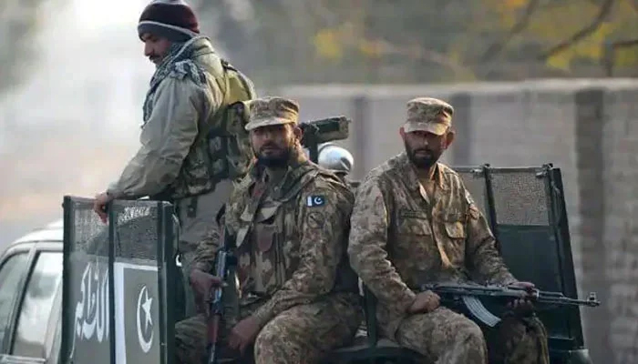 Soldiers ride on a Pakistan Army vehicle in this undated image. — AFP