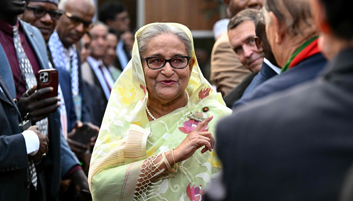 Bangladeshs PM Sheikh Hasina accepts greetings from the assembled media and election observers during a press conference, a day after she won the 12th parliamentary elections, in Dhaka on January 8, 2024. — AFP