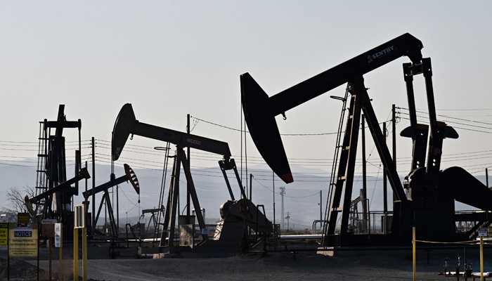 Working oil pumpjacks on the outskirts of Maricopa in Kern County, California, on September 21, 2023. — AFP