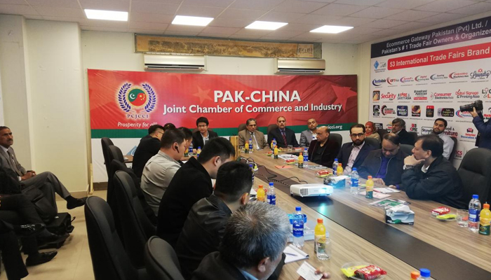 Chinese and Pakistani officials during a session of the Pakistan-China Joint Chamber of Commerce and Industry. — PCJCCI website