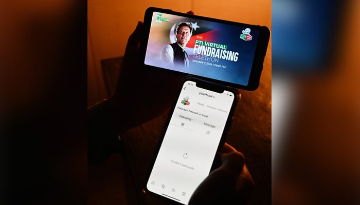 A man shows the social media app of the official site of the Pakistan Tehreek-e-Insaf (PTI), in Islamabad on January 7, 2024. — AFP