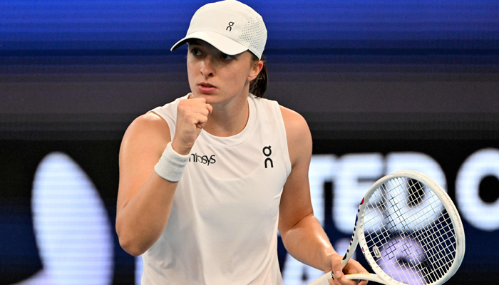 Polands Iga Swiatek reacts on a point against Germanys Angelique Kerber during their womens singles final match at the United Cup tennis event on Ken Rosewall Arena in Sydney on January 7, 2024. — AFP