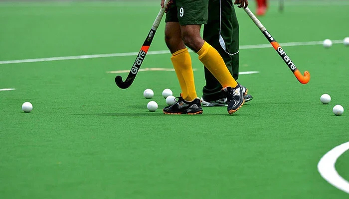 This representational image shows hockey players on a field. — Radio Pakistan/File