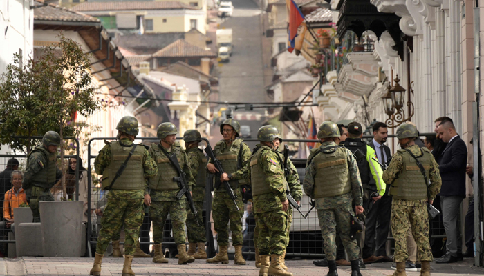 Security forces stand guard outside of Carondelet Palace in Quito on January 10, 2024, as Ecuador remains in a state of emergency following the escape from prison of a dangerous narco boss. — AFP