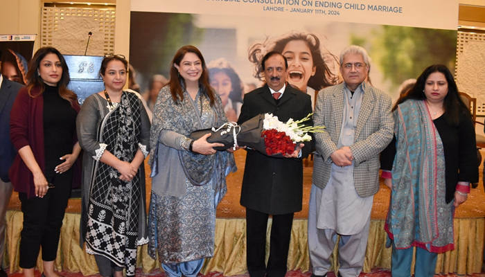 Punjab Minister for Primary and Secondary Healthcare Dr. Jamal Nasir (3rd R) takes a pose with the National Commission on the Status of Women (NCSW) team on January 11, 2024. —X/@ncswpk