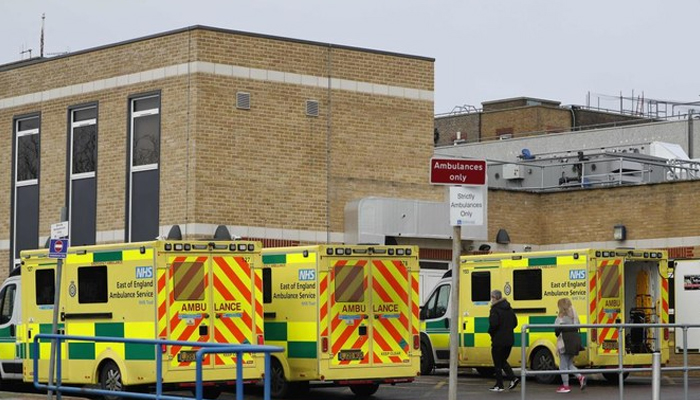 Ambulances are parked outside Southend University Hospital in Essex, eastern England. — AFP/File
