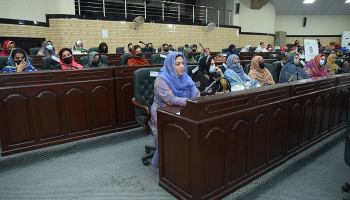Women sit during a programme in Shaheed Benazir Bhutto Women University Peshawar on November 7, 2024. — Facebook/Shaheed Benazir Bhutto Women University, Peshawar