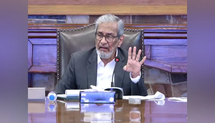 Sindh caretaker chief minister Justice (retd) Maqbool Baqar chairing a meeting in CM House Karachi on October 23, 2023, in this screengrab. — Facebook/Sindh Government