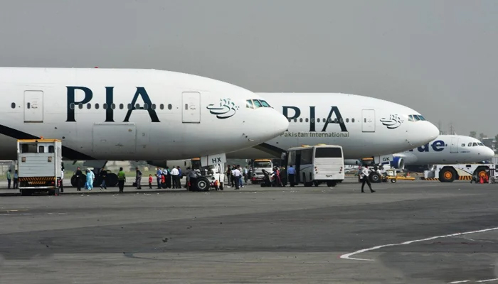 Pakistan International Airlines passenger planes can be seen parked in this image released on September 11, 2021. — X/@AFP