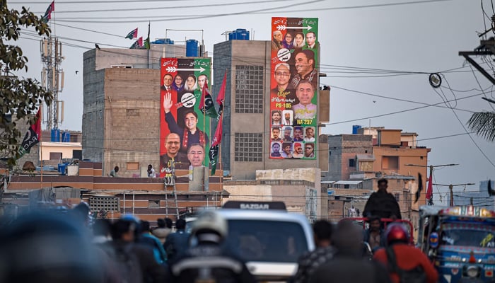 A billboard of Pakistan Peoples Party featuring Bilawal Bhutto Zardari, along a road in Karachi on January 12, 2024. — AFP
