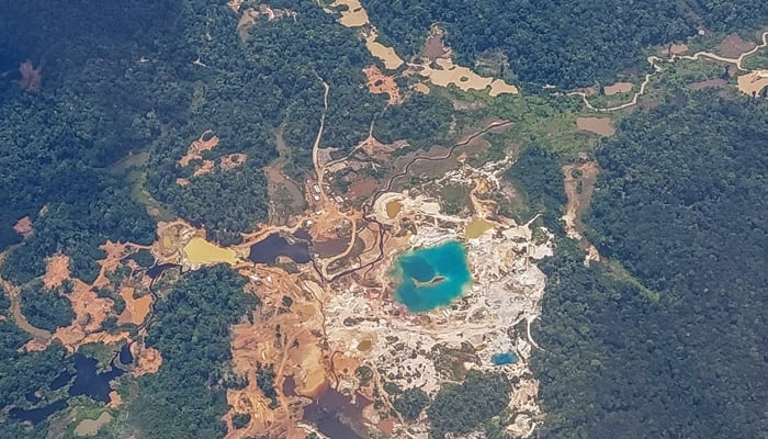 Aerial view of a mining site in a section of the Amazon rainforest in western Guyana, on April 12, 2023. — AFP