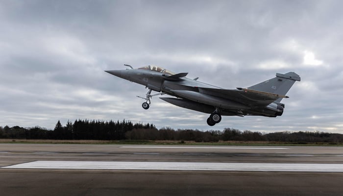 This photograph taken January 12, 2023 at the Lann-Bihoue French Navy airbase in Queven, western France, shows a French multirole fighter aircraft Rafale F3R Marine, as it prepares to land on the tarmac. — AFP