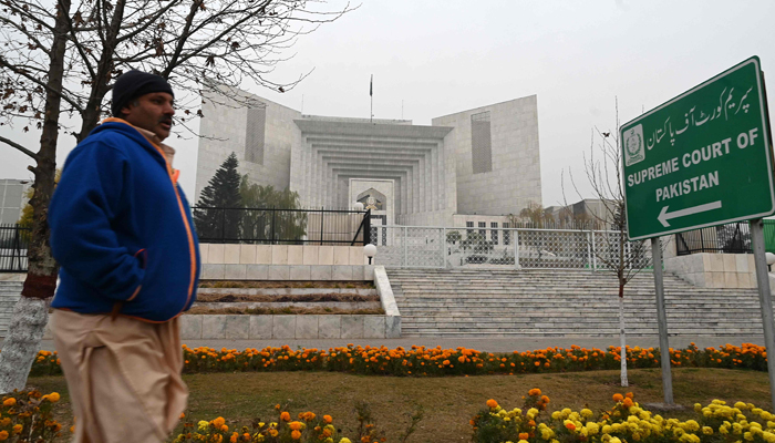 A man walks past the Supreme Court building in Islamabad on January 12, 2024. — AFP