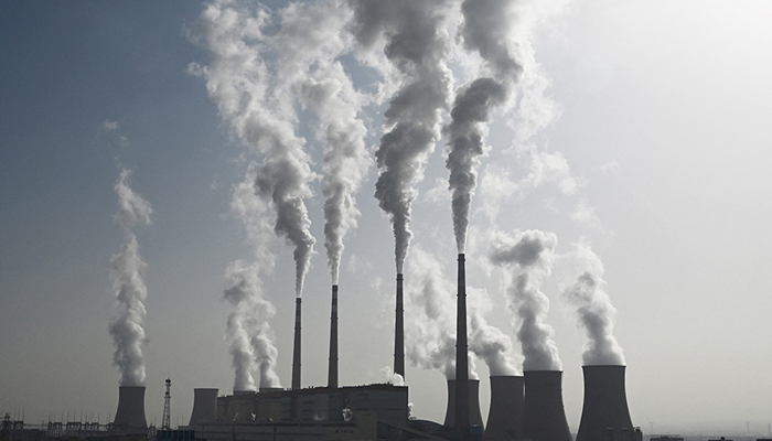 This image shows smoke coming out into the air from a coal-fired power plant. — AFP/File