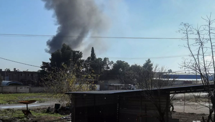 This image shows the Smoke billow in Qamishli in northeastern Syria close to the Turkish border on 25 December 2023.—AFP